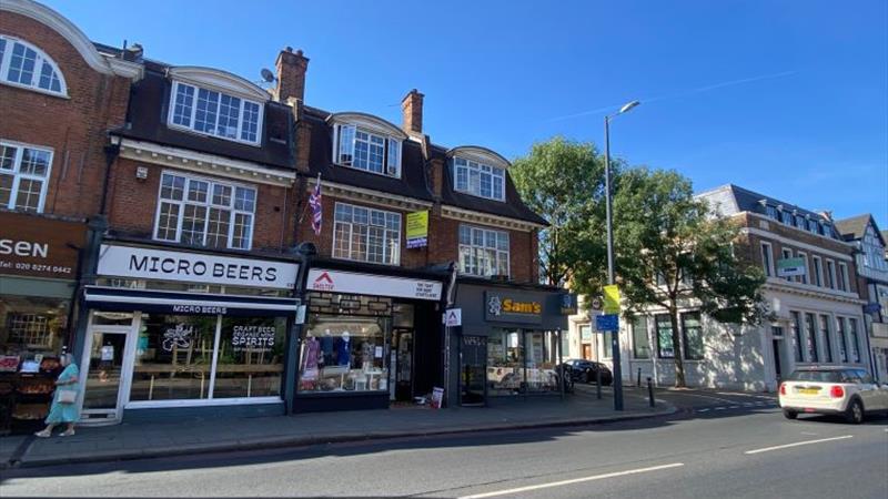 Freehold Investment Shop & Two Flats